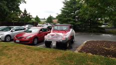 Monsour's jeep wrapped in the slip-and-slide like a present. Notice the bow on the front.