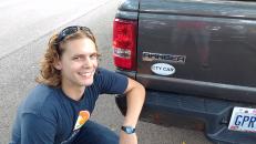 Posing with my bumper sticker award